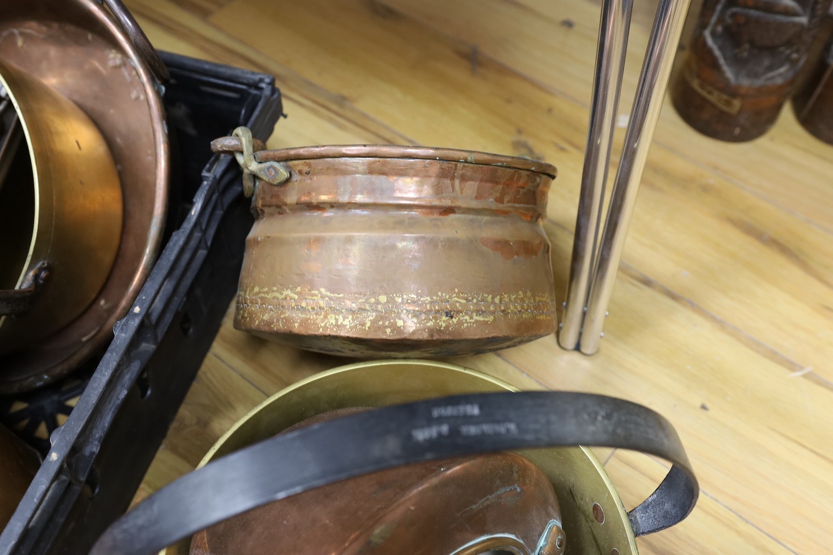 Mixed copper kettles, brass pot, a copper scuttle etc.